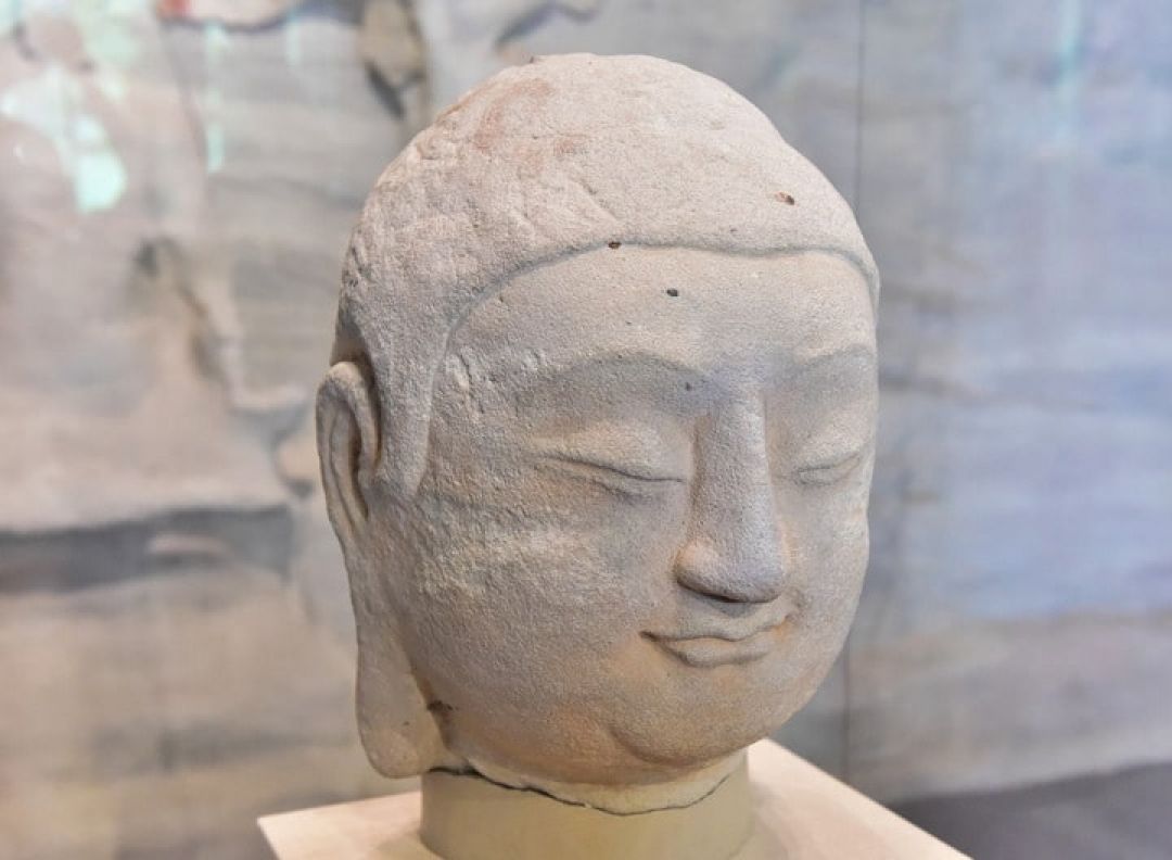 Kepala Buddha Goa Tianlongshan yang Hilang Dikembalikan ke Tiongkok-Image-1