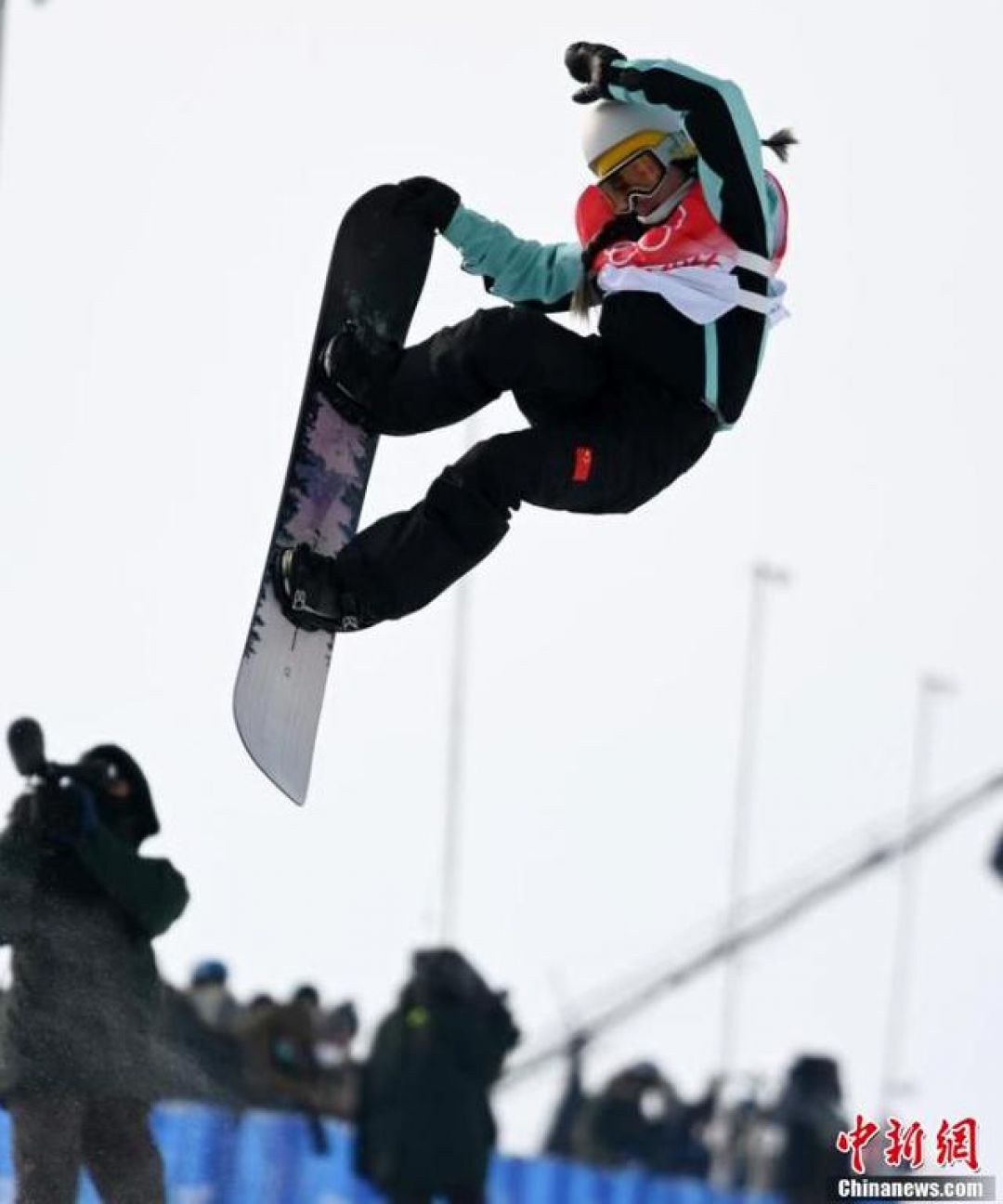POTRET: Atlet Seluncur Salju Wanita China Dalam Kompetisi U-Shaped-Image-4