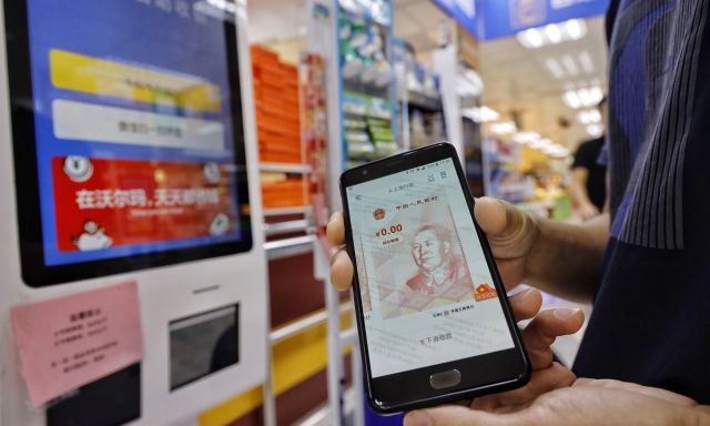 Uji Coba Mata Uang Digital, Beijing akan Terbitkan 'Paket Merah' Bagikan $1,55 Dolar-Image-1